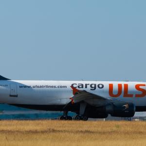 A rare ULS Cargo Airbus A310 is seen taxiing off the runway at Paris Charles de Gaulle Airport shortly after landing.